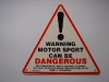 Warning: Motorsport can be dangerous                              